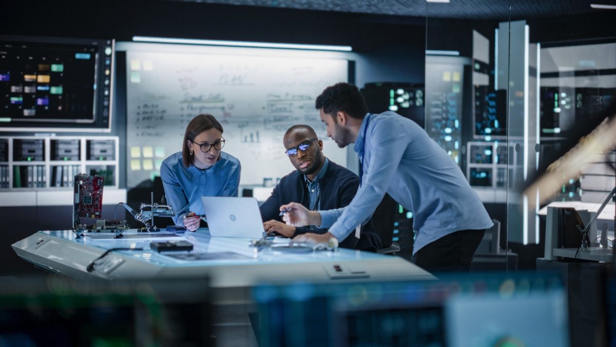 Technology team collaborating in a modern operations environment